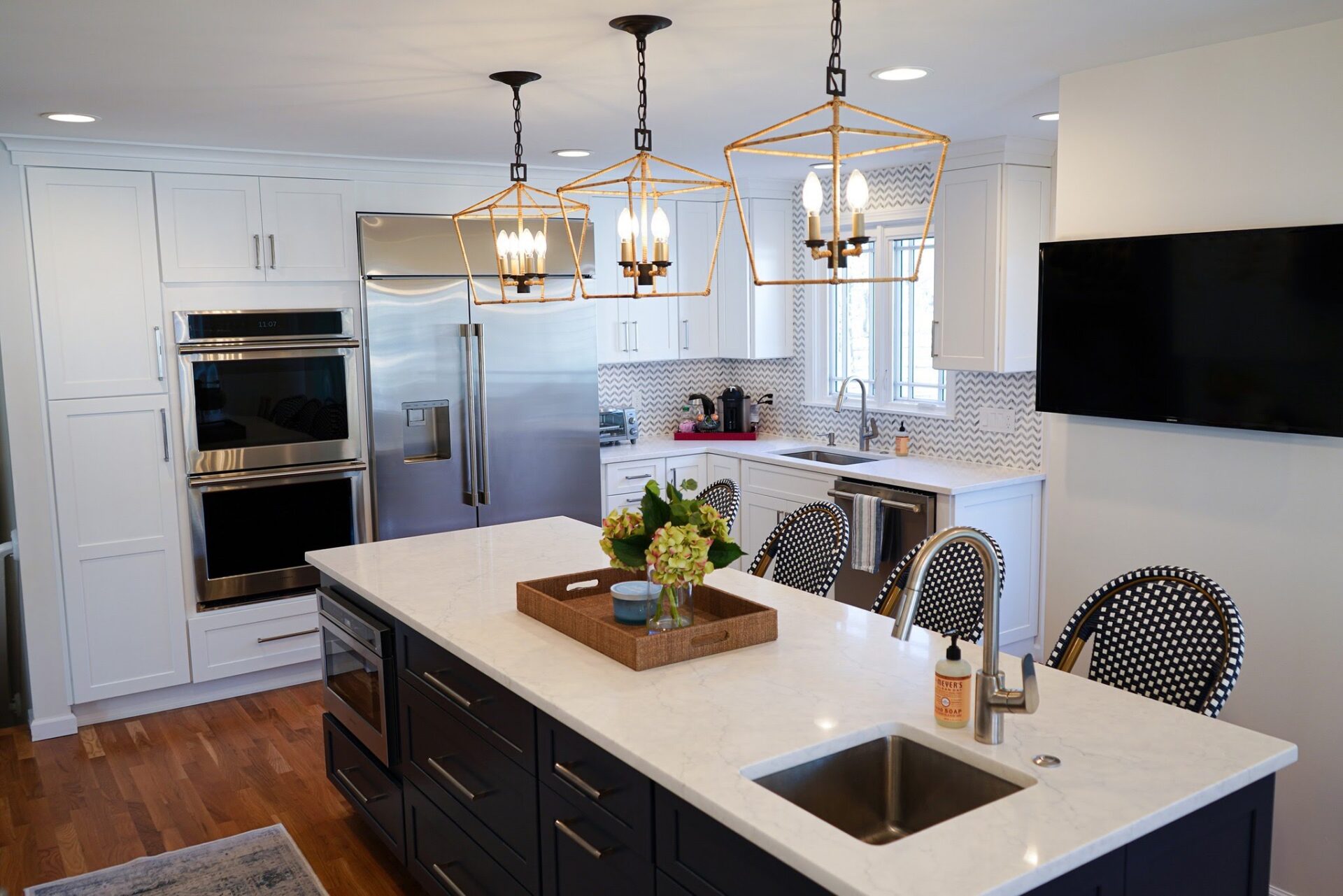 ac0d90c8f590f1e4a08994c7e24d49ae56295ed8-1 Newly remodeled kitchen in West Hartford connecticut. Quartz counters and beautiful chandeliers.